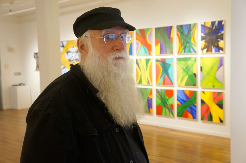 Brooklyn-based painter Sam Jungkurth at his Chelsea, New York exhibition of large, colorful geometrical paintings.